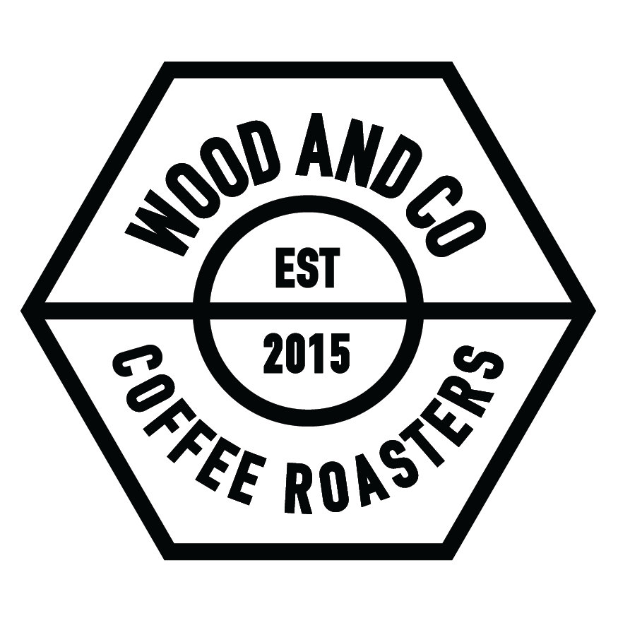 ood and Co Coffee logo: black hexagon with 'Wood and Co Coffee' text on a white background